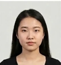 Approved example: neutral expression, even light, plain background