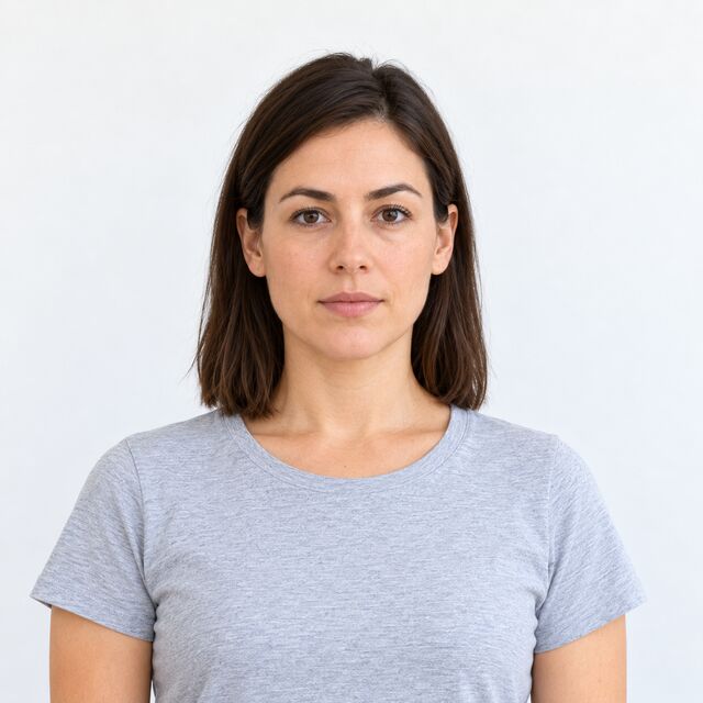 Woman facing the camera straight on with a neutral expression, no glasses or hat